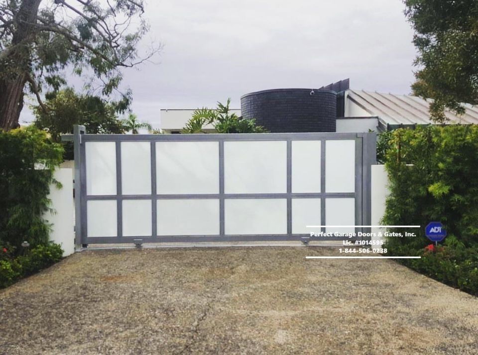 Custom White Laminated Glass Sliding Driveway Gate with Silver Framing