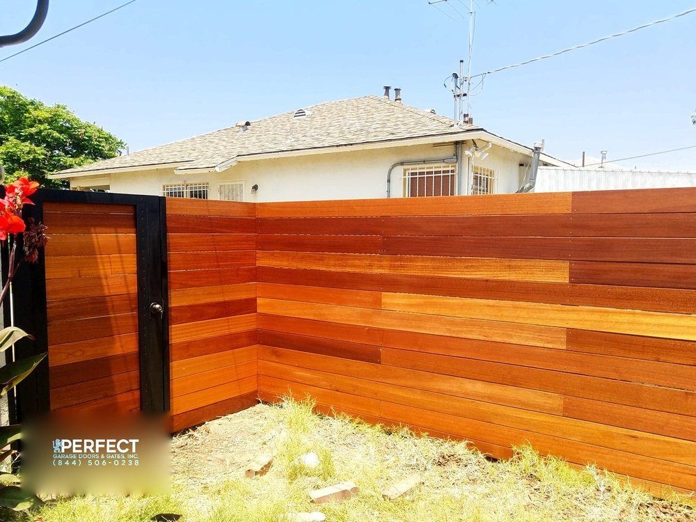 Custom Stained Horizontal Wood Fence with Iron Framed Side Gate