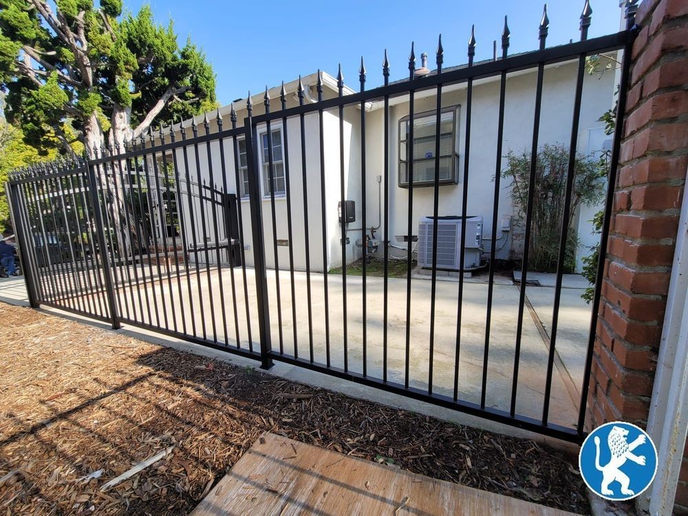 Custom Vertical Iron Fence with Ornamental Spikes