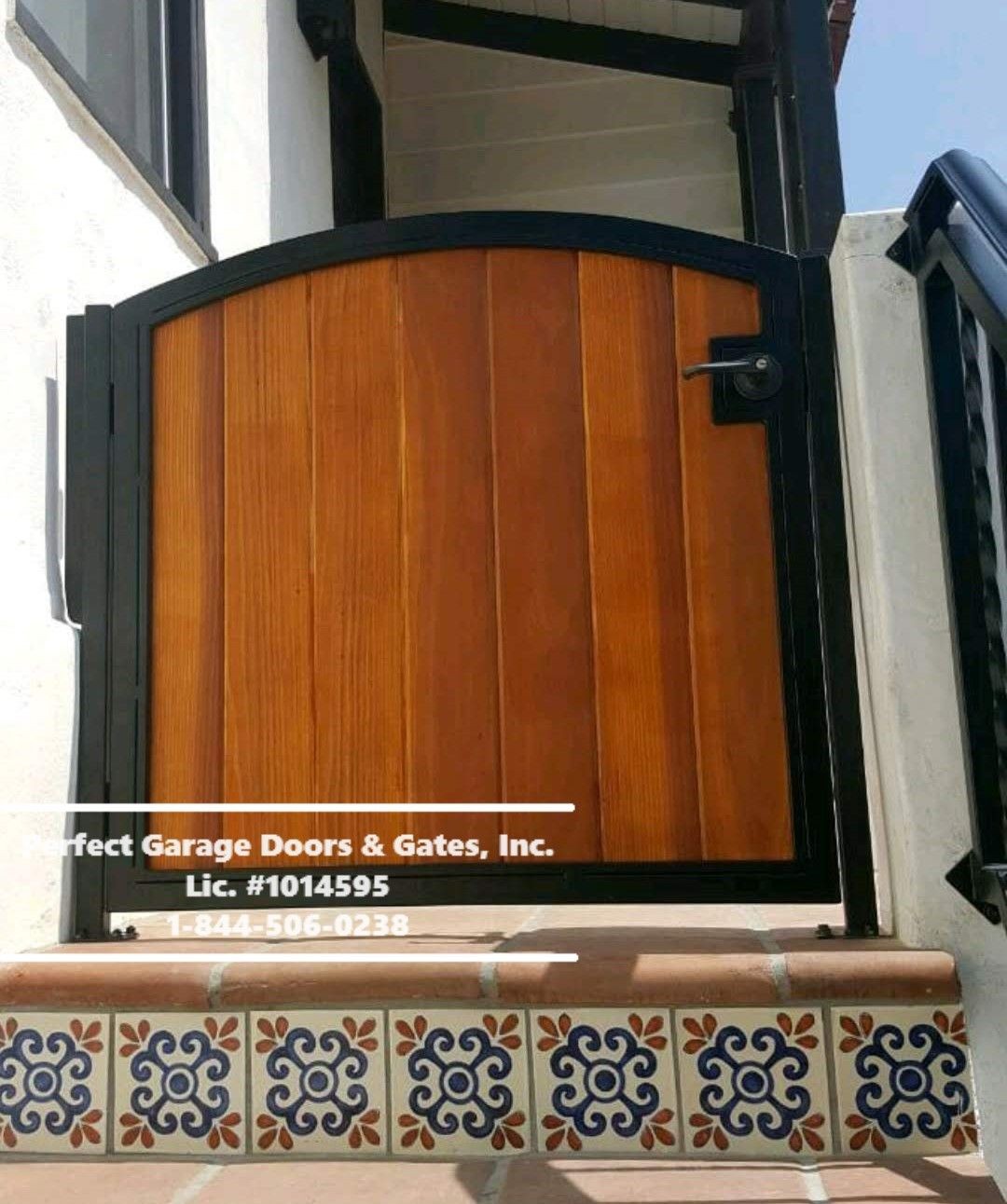 Custom Stained Vertical Wood Pedestrian Gate with Iron Frame and Arch