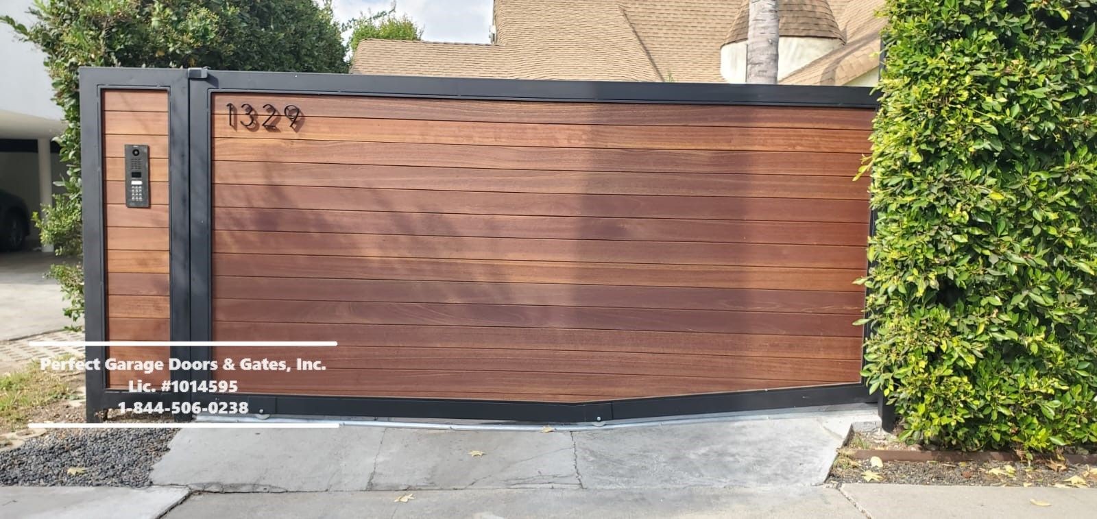 Custom Stained Horizontal Wood Sliding Driveway Gate with Custom Iron Frame