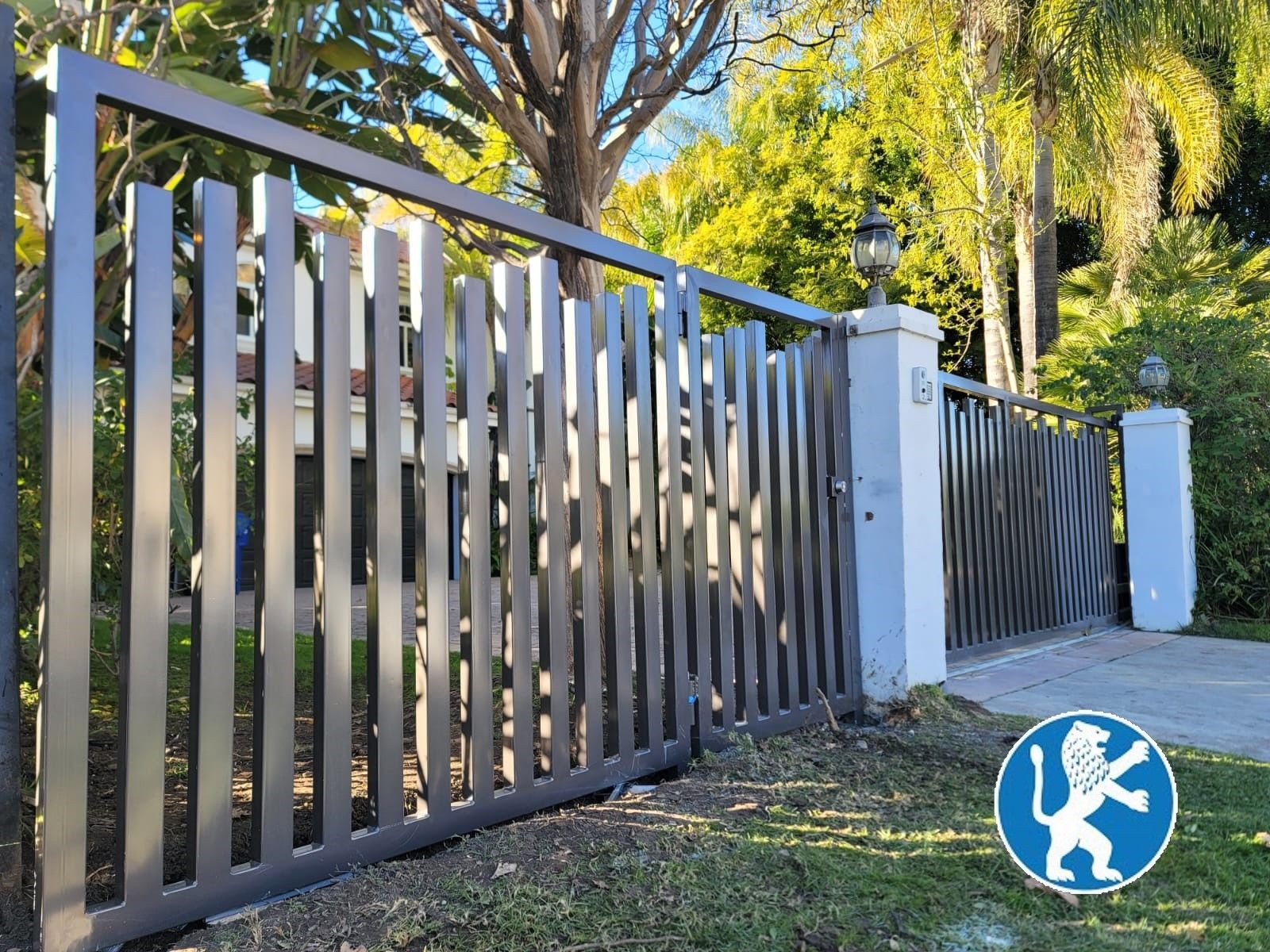 Custom Vertical Cut Iron with Matching Pedestrian & Driveway Gate