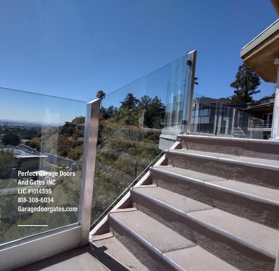 Custom Frameless Glass Stair Railing with Iron Posts