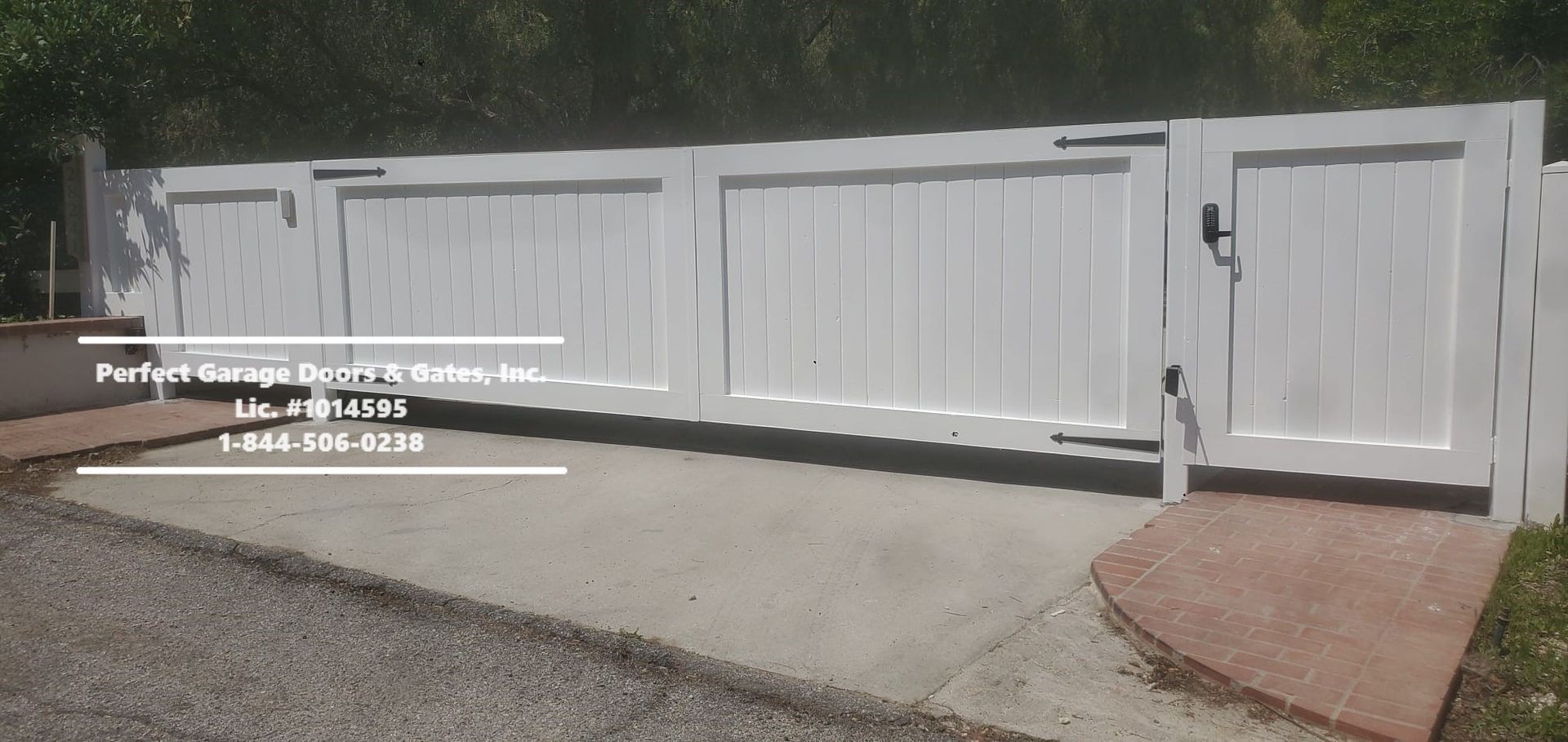 Custom Painted Vertical Wood Double Swing Driveway Gate with Overlay Frame and Decorative Hinges