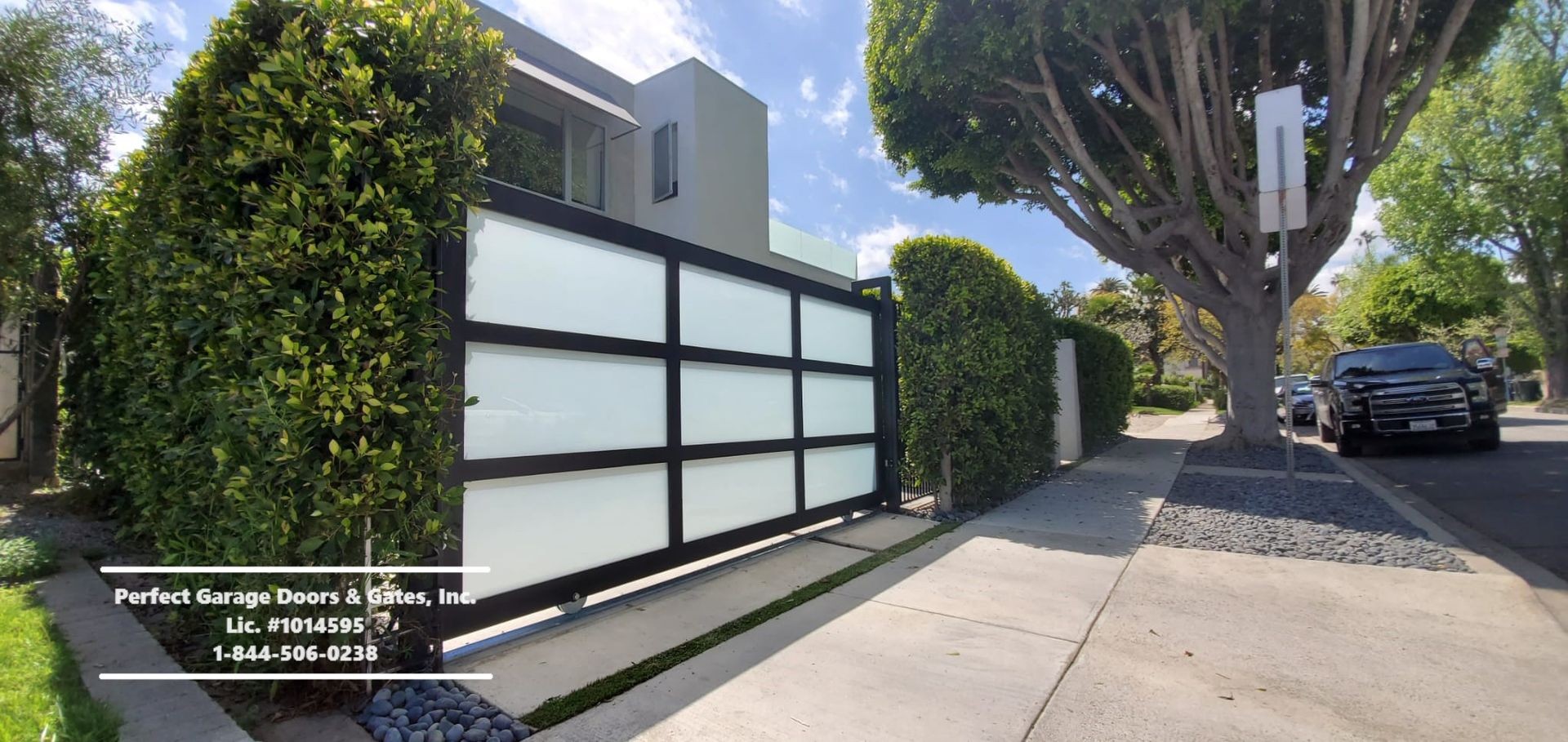 Custom White Laminated Glass Sliding Driveway Gate with Black Framing