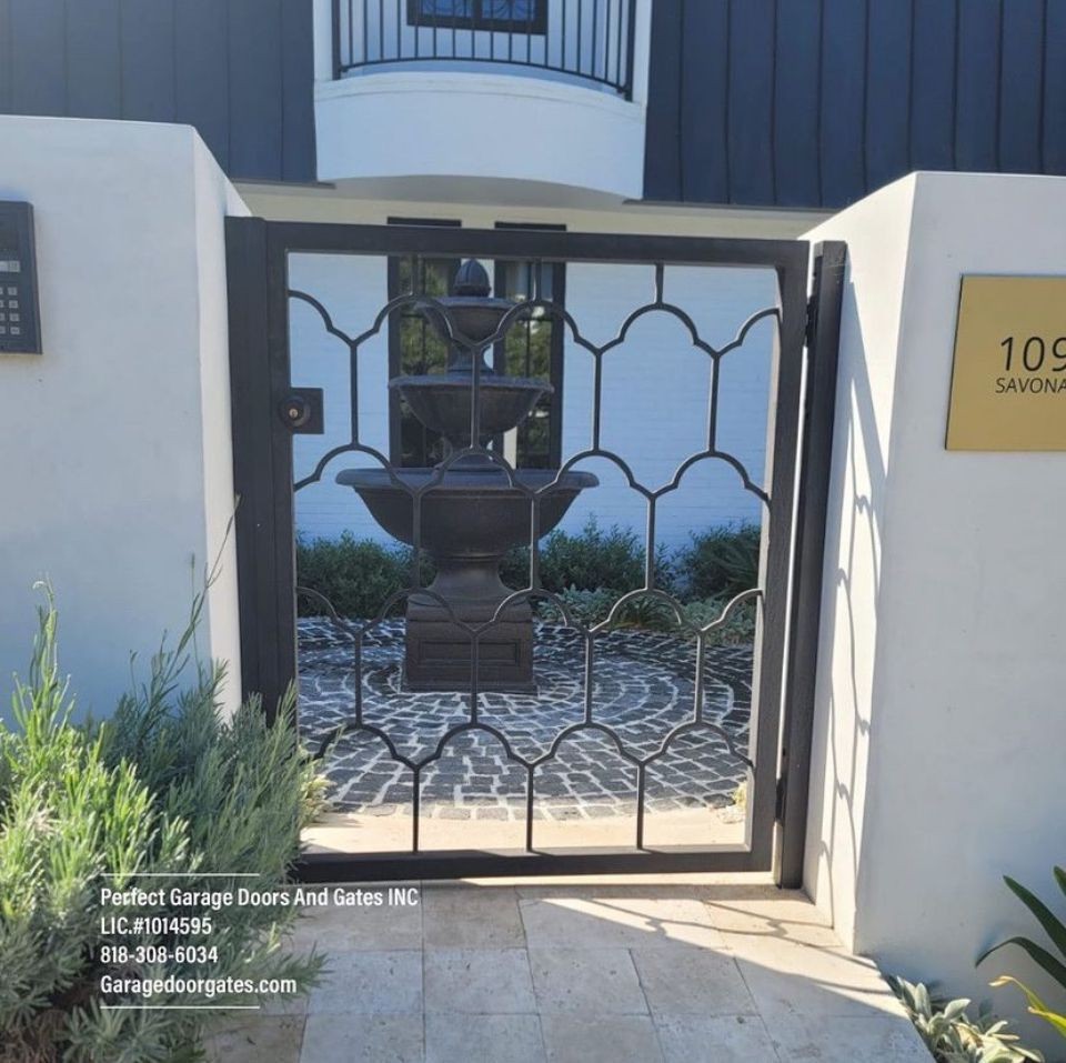 Custom Iron Pedestrian Gate with Ornamental Design