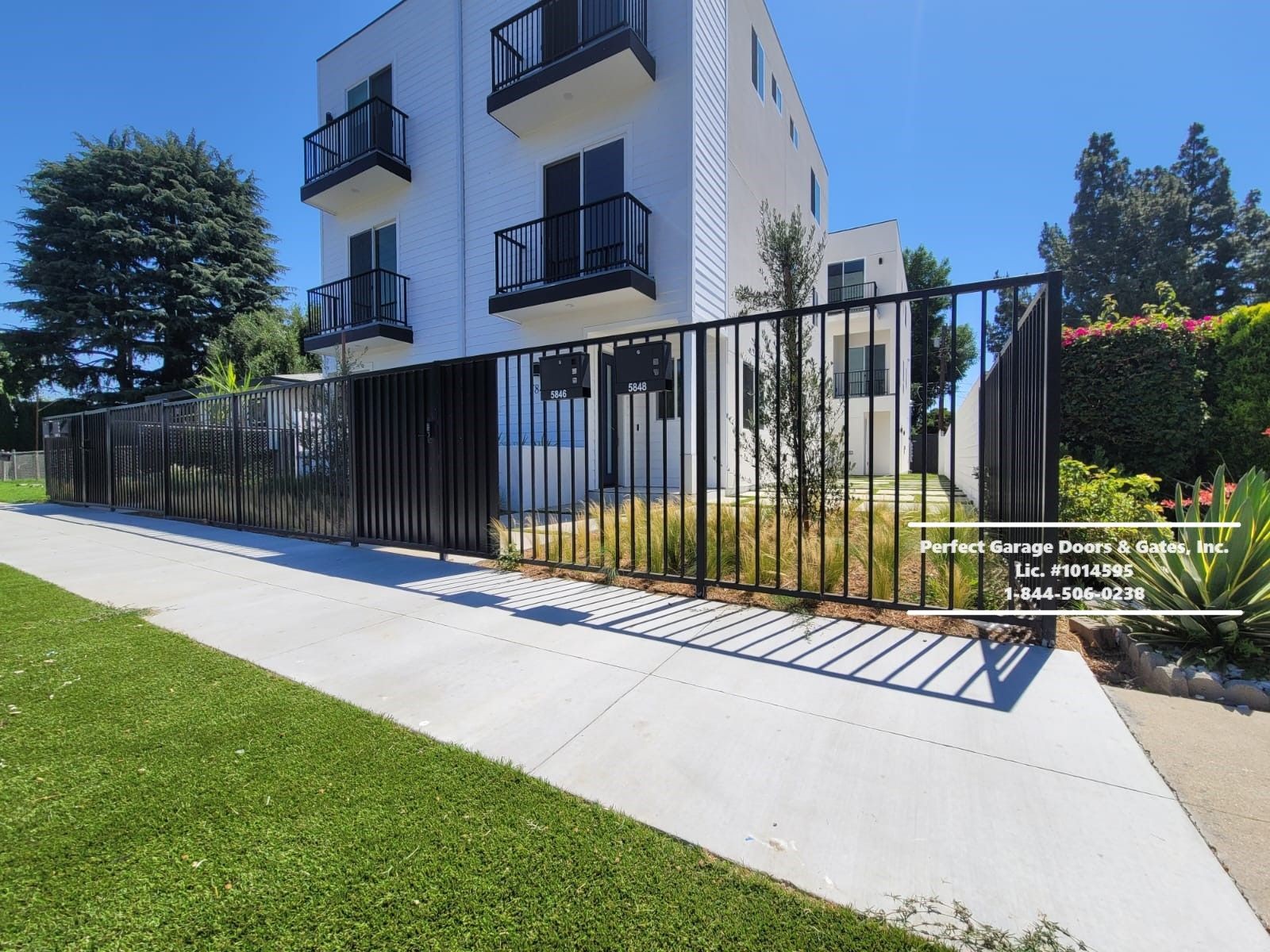 Custom Vertical Iron Fence with Pedestrian Gates