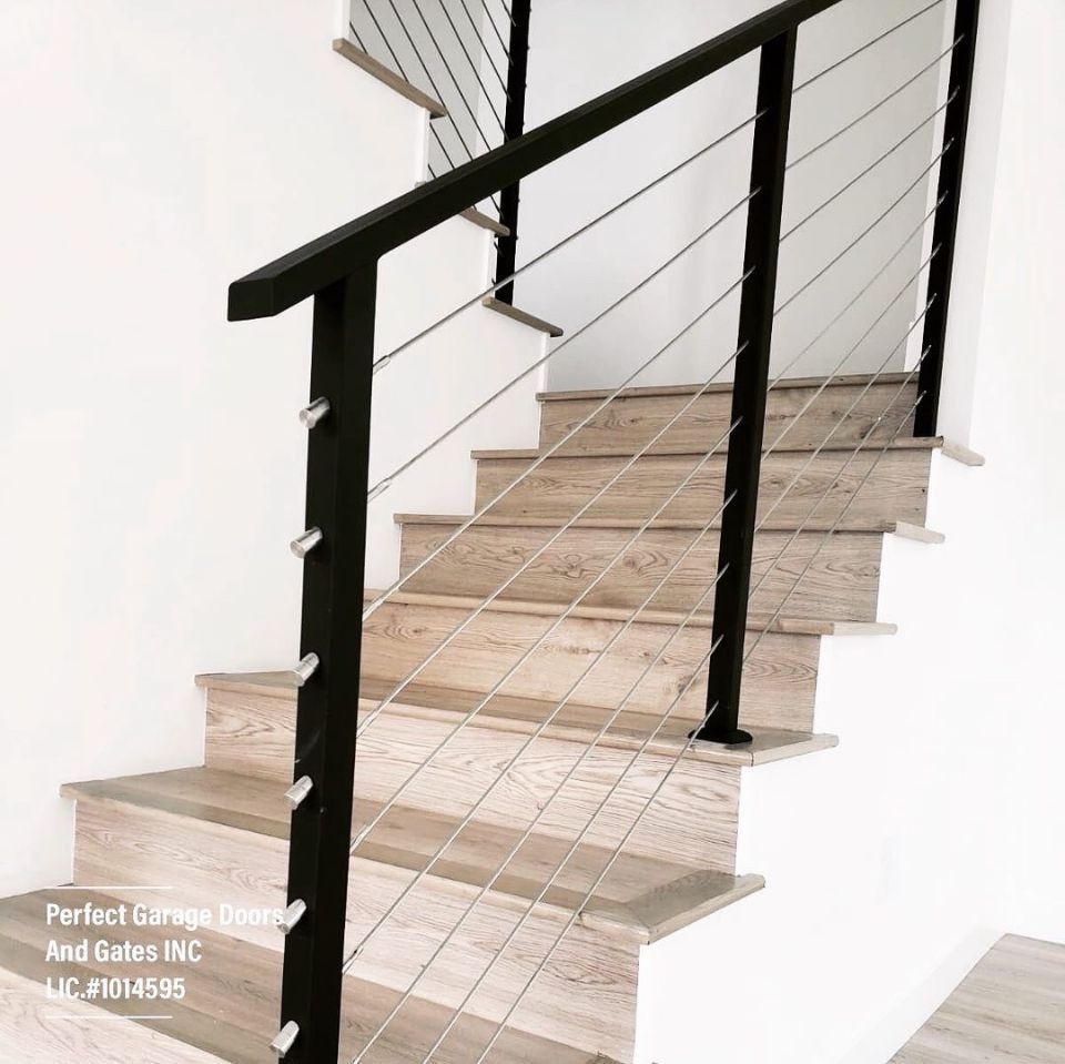 Custom Stainless Steel Cable Interior Stair Railing with Iron Posts and Top Rail