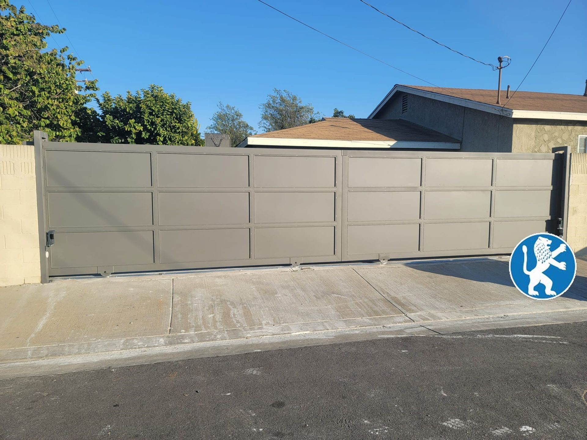 Custom Shaker Style Iron Double-Sliding Driveway Gate with Sheet Metal