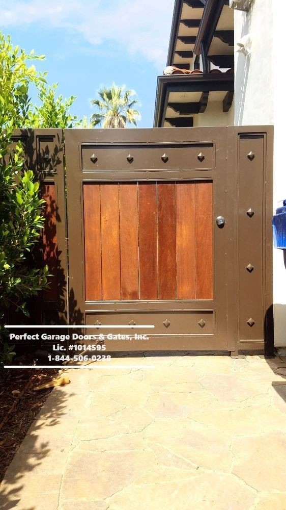 Custom Stained Vertical Wood Side Gate with Custom Iron Framing